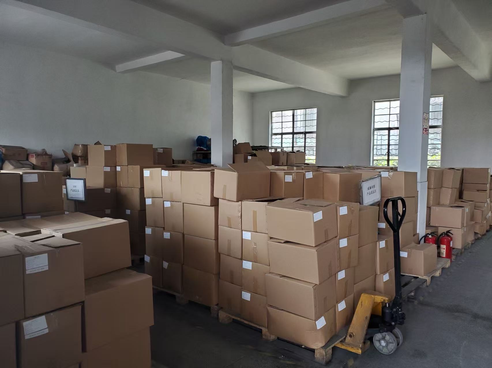 Packed cartons in the Labei Rubber packing area